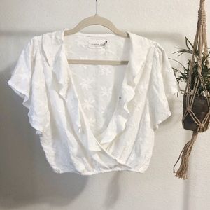 White Top with floral print and button closure